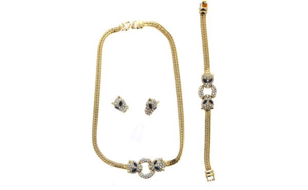 Parure fantaisie en métal doré et strass