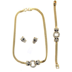 Parure fantaisie en métal doré et strass