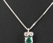 Pendentif en or gris 750ème et émeraude,
