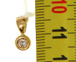Pendentif rond en or jaune 18 cts serti 
