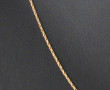 Chaîne en or jaune 18 cts, poinçonnée tê