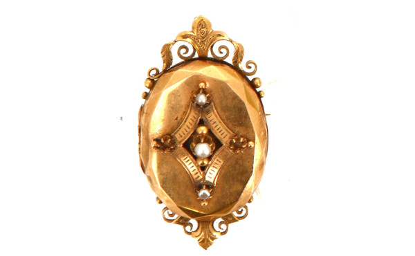 Broche ouvrante en or 18 cts. Poids brut