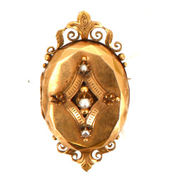 Broche ouvrante en or 18 cts. Poids brut