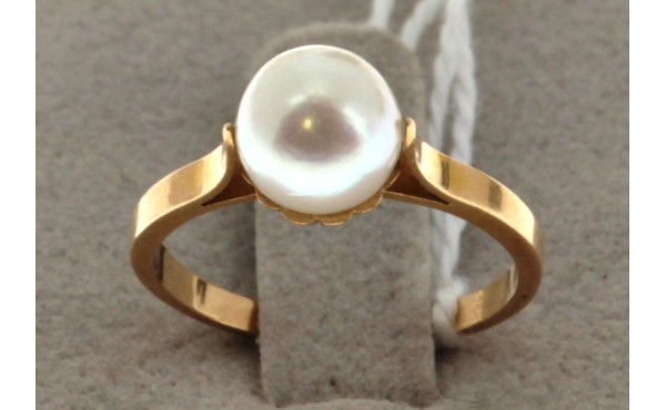 Bague en or jaune 18 carats, poinçon têt