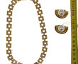 Collier fantaisie en métal doré et stras