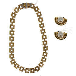Collier fantaisie en métal doré et stras