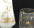 Verre ancien à fond plat à décor doré de