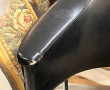 Fauteuil des années 50 en skaï noir clou