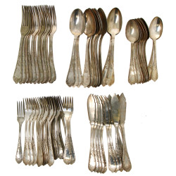 Ménagère à décor rocaille en argent 800è