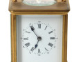 Pendule dite d'officier en métal doré (s
