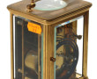 Pendule dite d'officier en métal doré (s