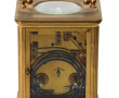 Pendule dite d'officier en métal doré (s