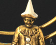 Petit sujet décoratif en métal doré en f