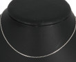 Chaîne en or gris 18 cts, poinçon tête d