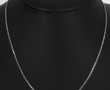 Chaîne en or gris 18 cts, poinçon tête d