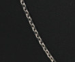 Chaîne en or gris 18 cts, poinçon tête d