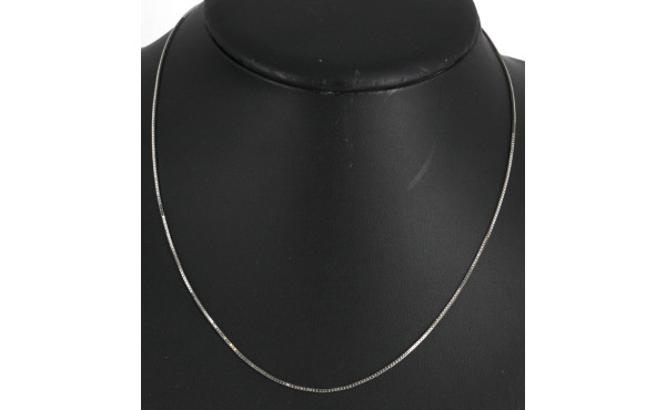 Chaîne en or gris 18 cts, poinçon tête d