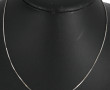 Chaîne en or gris 18 cts, poinçon tête d