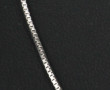 Chaîne en or gris 18 cts, poinçon tête d