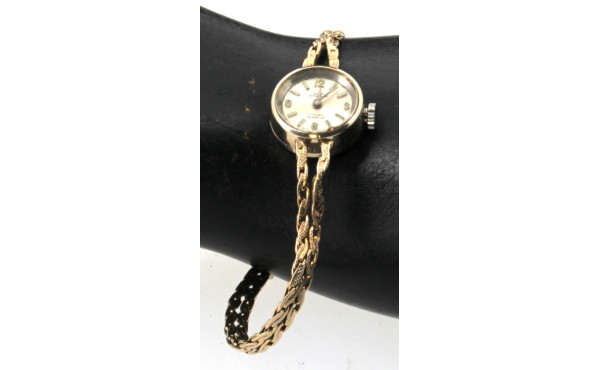 Petite montre bracelet de dame suisse, e