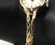 Petite montre bracelet de dame suisse, e