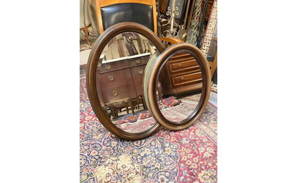 2 miroirs de forme ovale l'un en bois fo