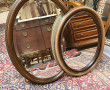 2 miroirs de forme ovale l'un en bois fo