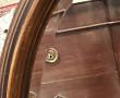 2 miroirs de forme ovale l'un en bois fo