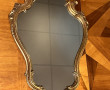 Miroir rocaille à encadrement doré, 72 x