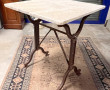 Table piètement en fonte et plateau marb