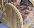 Fauteuil à oreilles en rotin. H 108 x L 
