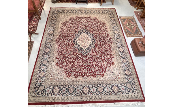 Tapis en laine points noués dans les ton