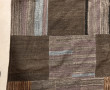 Tapis souple moderne dans les tons bruns