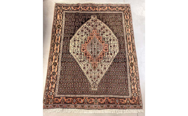 Tapis en laine points noués dans les ton