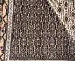 Tapis en laine points noués dans les ton