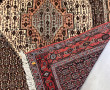 Tapis en laine points noués dans les ton