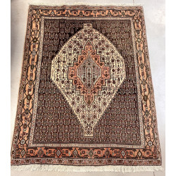 Tapis en laine points noués dans les ton