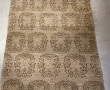 Tapis en laine dans les tons beige et br