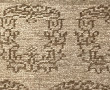 Tapis en laine dans les tons beige et br