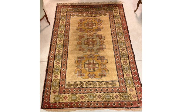Tapis en laine points noués dans les ton