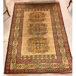 Tapis en laine points noués dans les ton