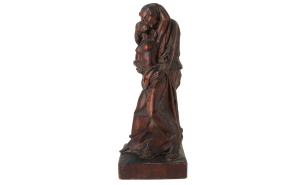 A. SIGY "Couple enlacé" en bois sculpté,