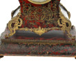 Pendule style Louis XV en marqueterie 