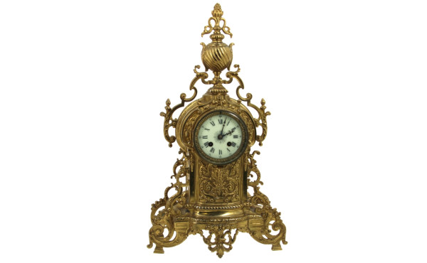 Pendule style Renaissance en laiton doré