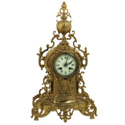 Pendule style Renaissance en laiton doré
