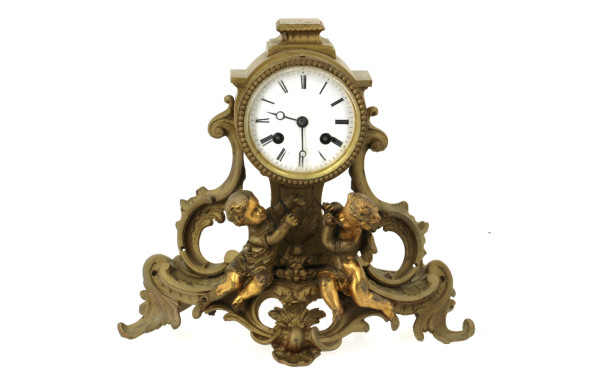 Pendule rocaille en bronze doré et redor