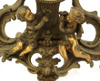 Pendule rocaille en bronze doré et redor