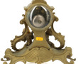 Pendule rocaille en bronze doré et redor