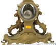 Pendule rocaille en bronze doré et redor