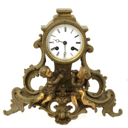 Pendule rocaille en bronze doré et redor